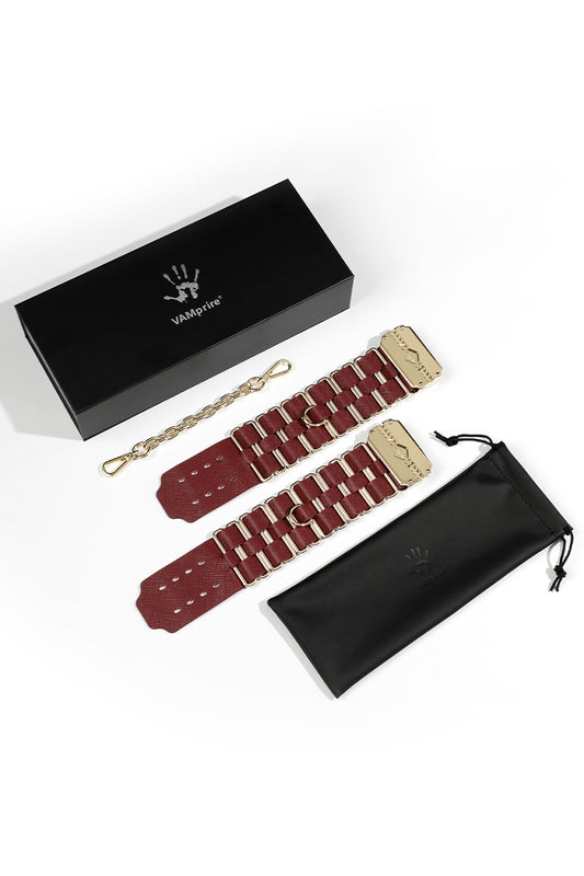 KEEN BOUND: LEATHER HANDCUFFS WITH GOLD HARDWARE