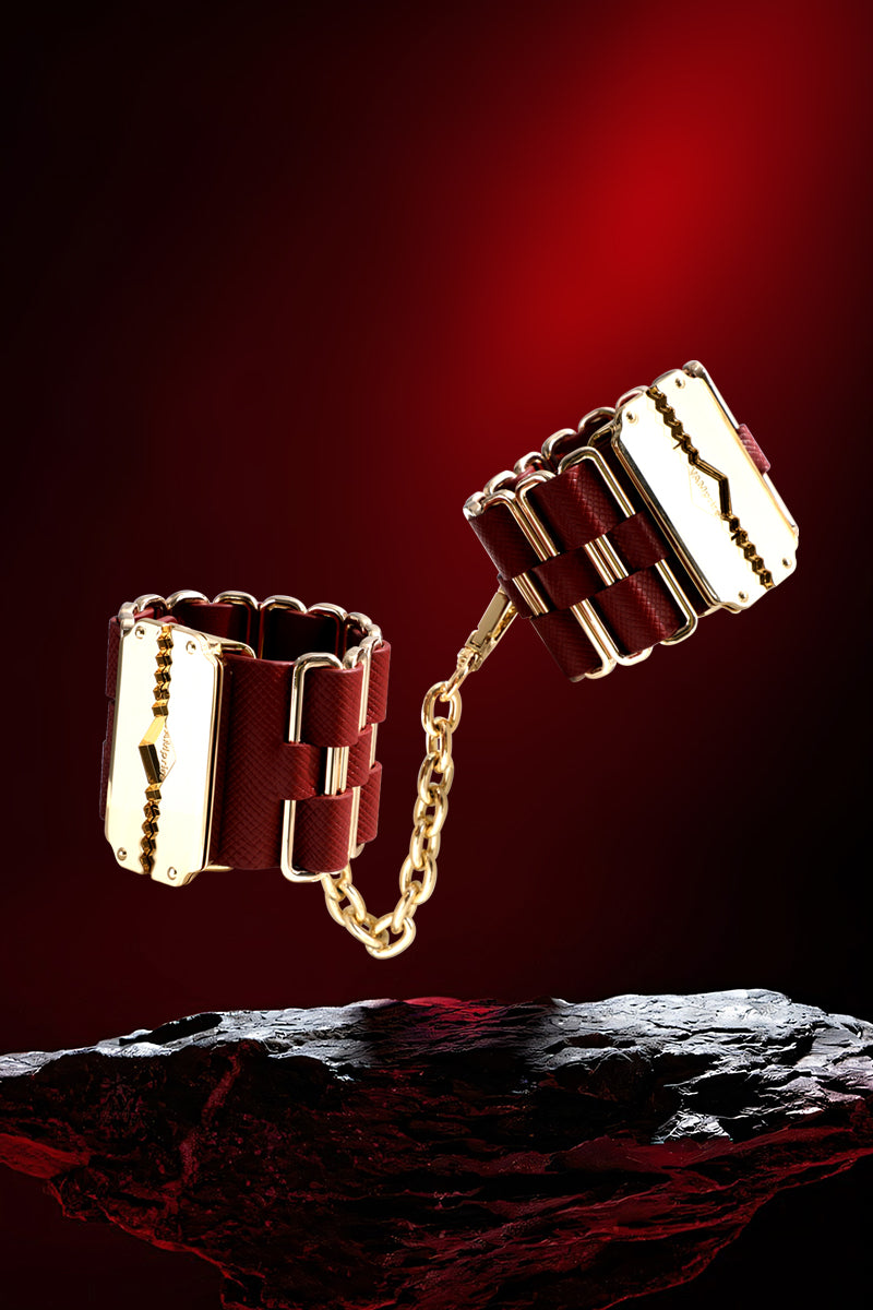 KEEN BOUND: LEATHER HANDCUFFS WITH GOLD HARDWARE