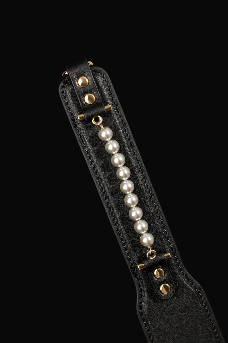 ETHEREAL RADIANCE: DOUBLE LEATHER PADDLE WITH PEARL ACCENT