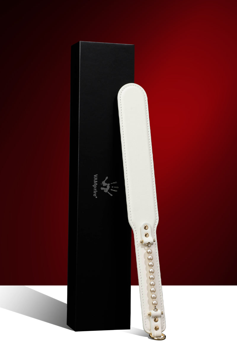 ETHEREAL RADIANCE: DOUBLE LEATHER PADDLE WITH PEARL ACCENT