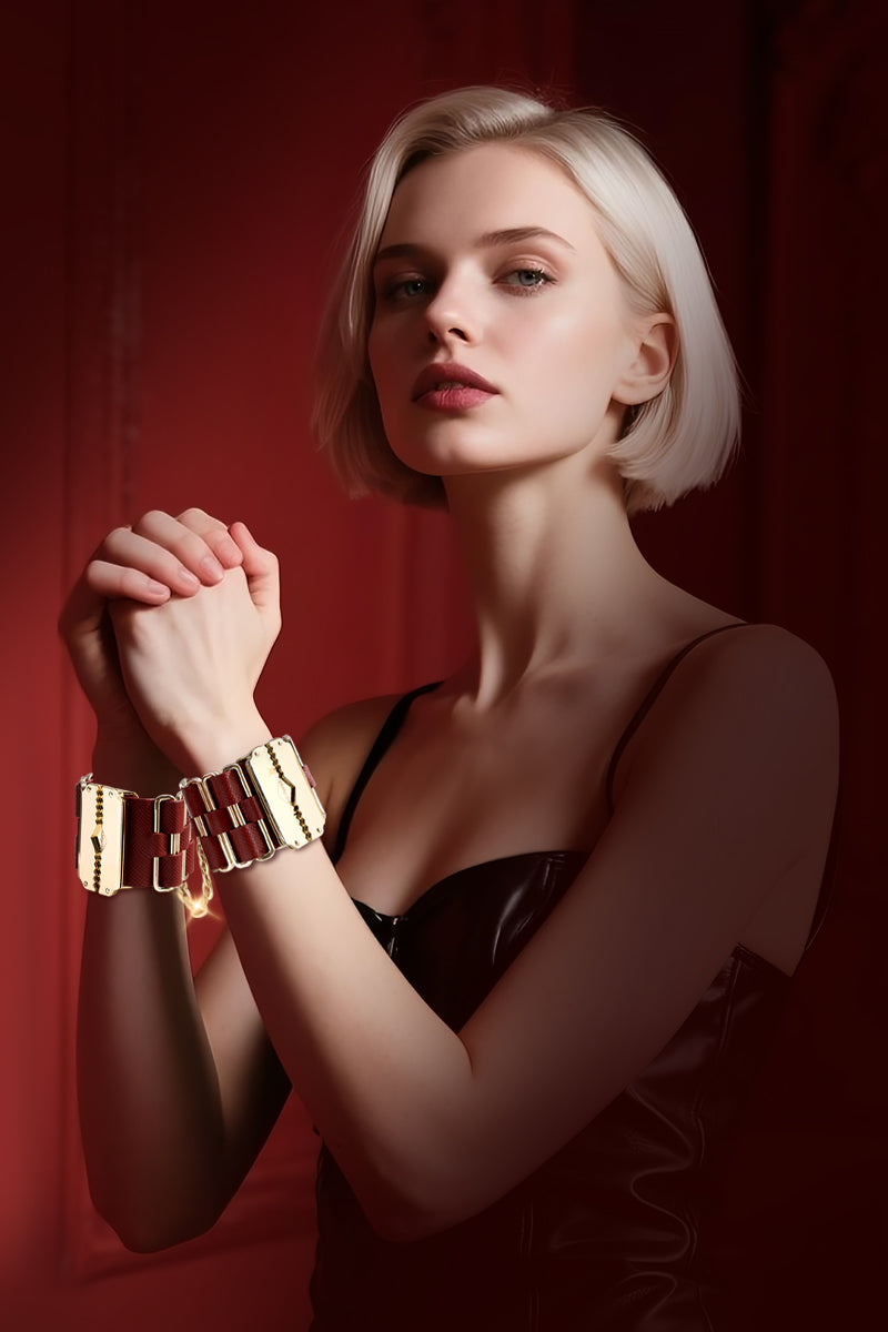 KEEN BOUND: LEATHER HANDCUFFS WITH GOLD HARDWARE
