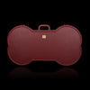 The Iron Clad Trunk — wine red leather restraints close-up