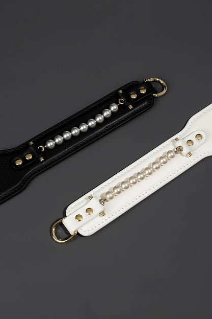 ETHEREAL RADIANCE: DOUBLE LEATHER PADDLE WITH PEARL ACCENT