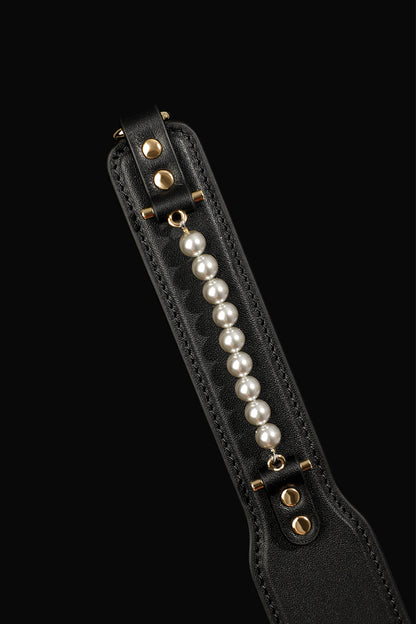 ETHEREAL RADIANCE: DOUBLE LEATHER PADDLE WITH PEARL ACCENT