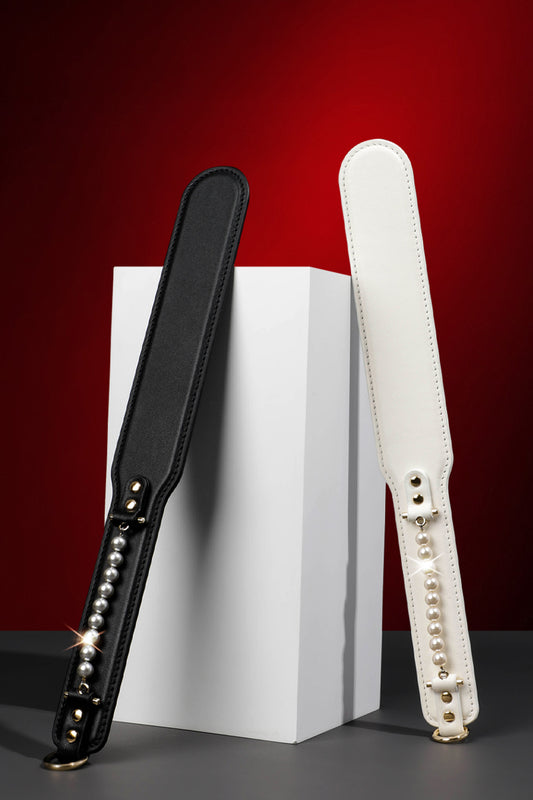 ETHEREAL RADIANCE: DOUBLE LEATHER PADDLE WITH PEARL ACCENT