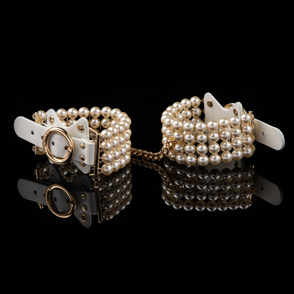 Ethereal Radiance Pearl Handcuffs — pearl handcuffs — white leather with lustrous pearls